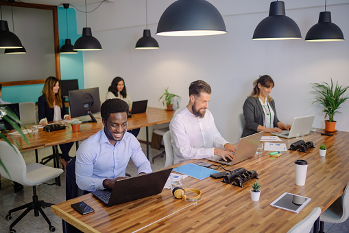 Velocity Shippings team collaborating in a modern office